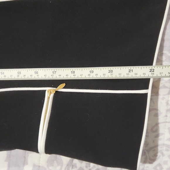 Classic black Tahari blazer with white trim, zipper pockets and sleeves. - Picture 8 of 12